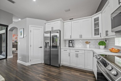 Welcome to a masterfully reimagined residence in the prestigious on Winston Trails Golf Course in Florida - for sale on GolfHomes.com, golf home, golf lot