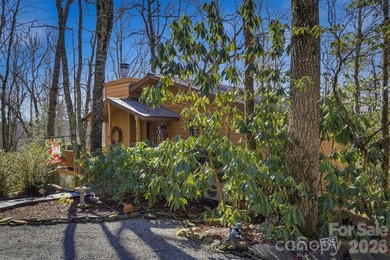 Escape to your own Blue Ridge retreat in the highly sought-after on Land Harbor Golf Course in North Carolina - for sale on GolfHomes.com, golf home, golf lot