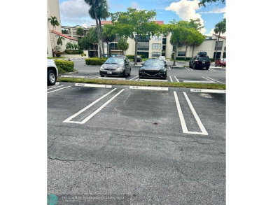 2-bedroom 2-bathroom condo located in the sought out all age's on Palm-Aire Country Club and Resort - Palms in Florida - for sale on GolfHomes.com, golf home, golf lot