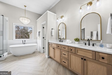 Welcome home to this 6-bedroom, 4-bath home tucked away on a on The Golf Club of Georgia in Georgia - for sale on GolfHomes.com, golf home, golf lot