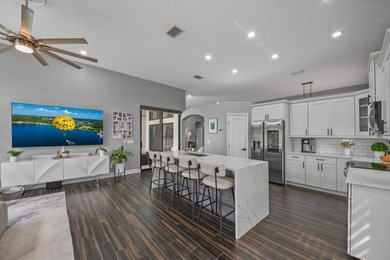 Welcome to a masterfully reimagined residence in the prestigious on Winston Trails Golf Course in Florida - for sale on GolfHomes.com, golf home, golf lot