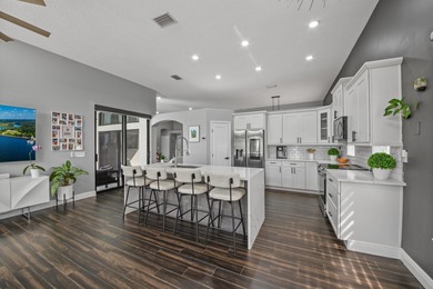 Welcome to a masterfully reimagined residence in the prestigious on Winston Trails Golf Course in Florida - for sale on GolfHomes.com, golf home, golf lot