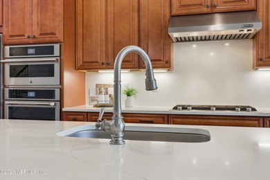 Exquisitely maintained 2018 craftsman residence offering 4BR/3BA on Selva Marina Country Club in Florida - for sale on GolfHomes.com, golf home, golf lot