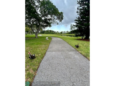 2-bedroom 2-bathroom condo located in the sought out all age's on Palm-Aire Country Club and Resort - Palms in Florida - for sale on GolfHomes.com, golf home, golf lot