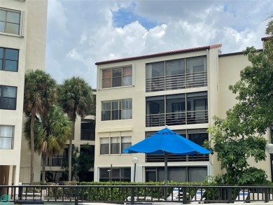 2-bedroom 2-bathroom condo located in the sought out all age's on Palm-Aire Country Club and Resort - Palms in Florida - for sale on GolfHomes.com, golf home, golf lot