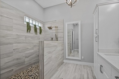 Welcome to a masterfully reimagined residence in the prestigious on Winston Trails Golf Course in Florida - for sale on GolfHomes.com, golf home, golf lot