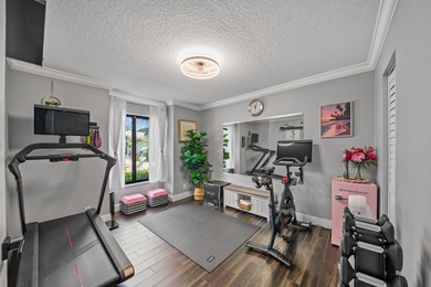 Welcome to a masterfully reimagined residence in the prestigious on Winston Trails Golf Course in Florida - for sale on GolfHomes.com, golf home, golf lot