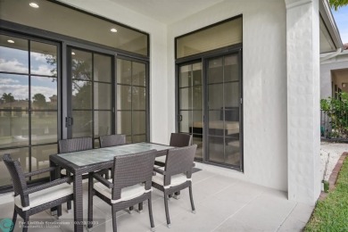 ZEN CONTEMPORARY 6 BED 4 BATH. OVERSIZED LOT, ON LAKE CUL DE SAC on Parkland Golf Club in Florida - for sale on GolfHomes.com, golf home, golf lot