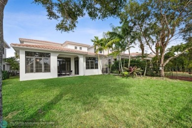 ZEN CONTEMPORARY 6 BED 4 BATH. OVERSIZED LOT, ON LAKE CUL DE SAC on Parkland Golf Club in Florida - for sale on GolfHomes.com, golf home, golf lot