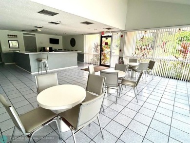 2-bedroom 2-bathroom condo located in the sought out all age's on Palm-Aire Country Club and Resort - Palms in Florida - for sale on GolfHomes.com, golf home, golf lot