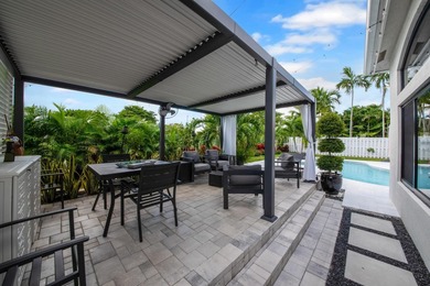 Welcome to a masterfully reimagined residence in the prestigious on Winston Trails Golf Course in Florida - for sale on GolfHomes.com, golf home, golf lot