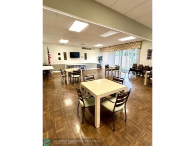 2-bedroom 2-bathroom condo located in the sought out all age's on Palm-Aire Country Club and Resort - Palms in Florida - for sale on GolfHomes.com, golf home, golf lot