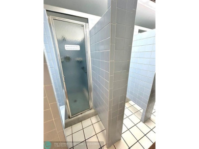 2-bedroom 2-bathroom condo located in the sought out all age's on Palm-Aire Country Club and Resort - Palms in Florida - for sale on GolfHomes.com, golf home, golf lot