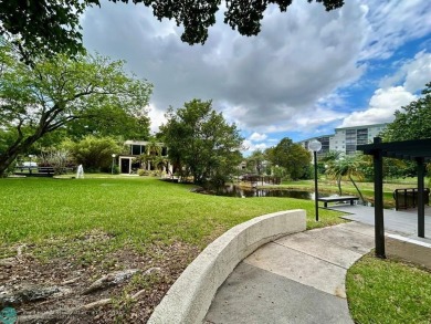 2-bedroom 2-bathroom condo located in the sought out all age's on Palm-Aire Country Club and Resort - Palms in Florida - for sale on GolfHomes.com, golf home, golf lot
