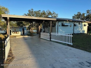 NO LOT RENT, it is a deeded lot, 2 bedrooms 1-1/2 Baths on Tooke on Glen Lakes Country Club in Florida - for sale on GolfHomes.com, golf home, golf lot