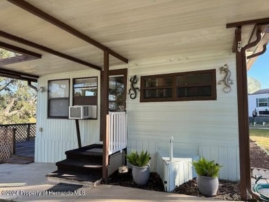 NO LOT RENT, it is a deeded lot, 2 bedrooms 1-1/2 Baths on Tooke on Glen Lakes Country Club in Florida - for sale on GolfHomes.com, golf home, golf lot