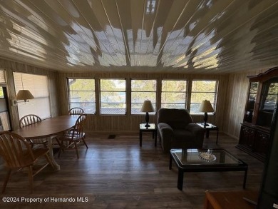NO LOT RENT, it is a deeded lot, 2 bedrooms 1-1/2 Baths on Tooke on Glen Lakes Country Club in Florida - for sale on GolfHomes.com, golf home, golf lot