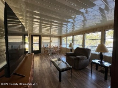 NO LOT RENT, it is a deeded lot, 2 bedrooms 1-1/2 Baths on Tooke on Glen Lakes Country Club in Florida - for sale on GolfHomes.com, golf home, golf lot