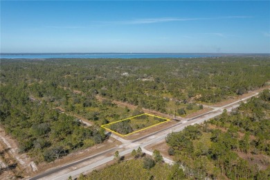 Welcome to Indian Lake Estates! This expansive corner lot, just on Indian Lake Estates Golf and Country Club in Florida - for sale on GolfHomes.com, golf home, golf lot