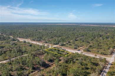 Welcome to Indian Lake Estates! This expansive corner lot, just on Indian Lake Estates Golf and Country Club in Florida - for sale on GolfHomes.com, golf home, golf lot