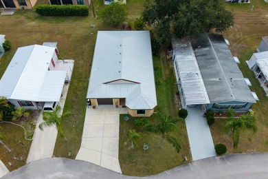 Located in the desirable Spanish Lakes 55+ community, this on Spanish Lakes Country Club in Florida - for sale on GolfHomes.com, golf home, golf lot