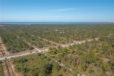 Welcome to Indian Lake Estates! This expansive corner lot, just on Indian Lake Estates Golf and Country Club in Florida - for sale on GolfHomes.com, golf home, golf lot