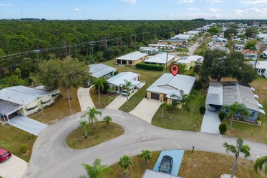 Located in the desirable Spanish Lakes 55+ community, this on Spanish Lakes Country Club in Florida - for sale on GolfHomes.com, golf home, golf lot