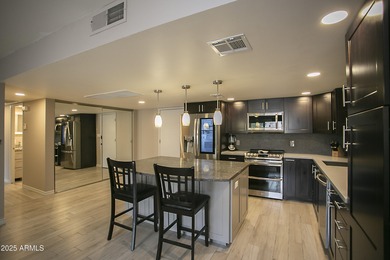 Outstanding open-concept contemporary remodel! Kitchen is chefs on Scottsdale Shadows in Arizona - for sale on GolfHomes.com, golf home, golf lot