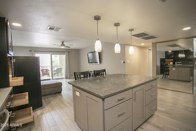 Outstanding open-concept contemporary remodel! Kitchen is chefs on Scottsdale Shadows in Arizona - for sale on GolfHomes.com, golf home, golf lot