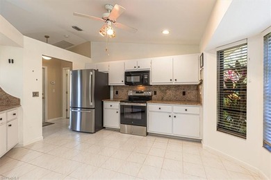 This well-maintained home in Riviera Golf Estates offers a on Riviera Golf Club in Florida - for sale on GolfHomes.com, golf home, golf lot