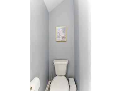 Double front porches set the tone for this thoughtfully updated on Charleston National Golf Club in South Carolina - for sale on GolfHomes.com, golf home, golf lot