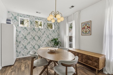 Double front porches set the tone for this thoughtfully updated on Charleston National Golf Club in South Carolina - for sale on GolfHomes.com, golf home, golf lot