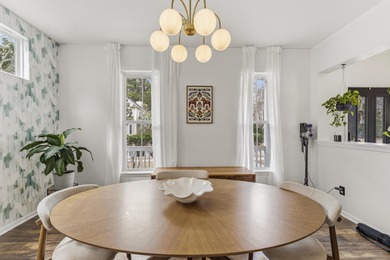 Double front porches set the tone for this thoughtfully updated on Charleston National Golf Club in South Carolina - for sale on GolfHomes.com, golf home, golf lot