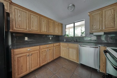 Welcome home to this beautifully maintained 2-bedroom on Hide-A-Way Lake Golf Course in Texas - for sale on GolfHomes.com, golf home, golf lot