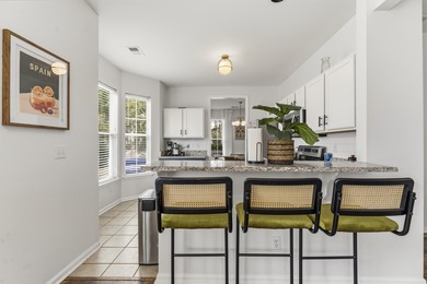 Double front porches set the tone for this thoughtfully updated on Charleston National Golf Club in South Carolina - for sale on GolfHomes.com, golf home, golf lot