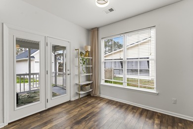 Double front porches set the tone for this thoughtfully updated on Charleston National Golf Club in South Carolina - for sale on GolfHomes.com, golf home, golf lot