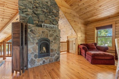 This exquisite custom log home is located in the heart of Bailey on Bailey Creek Golf Course in California - for sale on GolfHomes.com, golf home, golf lot