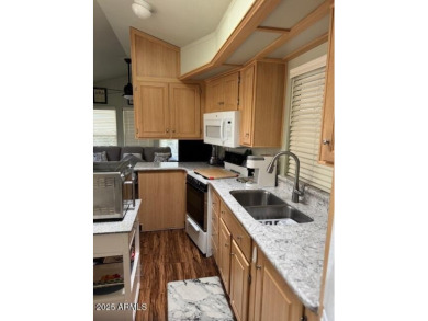 Retirement living at its best. Gated community, Club House with on Juniper Ridge R.V. Golf Resort in Arizona - for sale on GolfHomes.com, golf home, golf lot