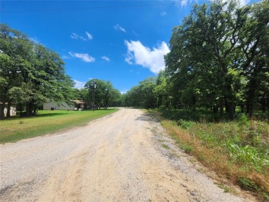 3 great lots creating .83 of an acre a nice corner lot for on Nocona Hills Golf Course in Texas - for sale on GolfHomes.com, golf home, golf lot