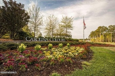 Beautiful 4-bedroom, 3-bath brick home located in the Carolina on Carolina Colours Golf Club in North Carolina - for sale on GolfHomes.com, golf home, golf lot