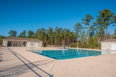 Beautiful 4-bedroom, 3-bath brick home located in the Carolina on Carolina Colours Golf Club in North Carolina - for sale on GolfHomes.com, golf home, golf lot
