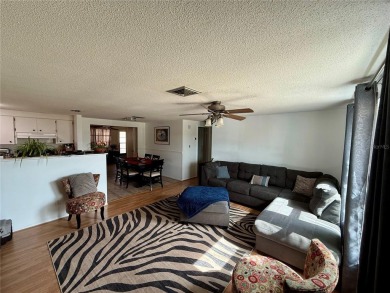 Discover Florida living in this inviting 2-bedroom, 1.5-bathroom on Venice East Golf Club in Florida - for sale on GolfHomes.com, golf home, golf lot