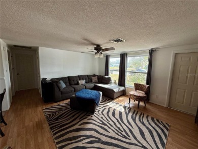 Discover Florida living in this inviting 2-bedroom, 1.5-bathroom on Venice East Golf Club in Florida - for sale on GolfHomes.com, golf home, golf lot
