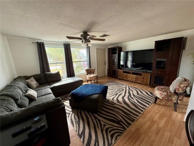 Discover Florida living in this inviting 2-bedroom, 1.5-bathroom on Venice East Golf Club in Florida - for sale on GolfHomes.com, golf home, golf lot