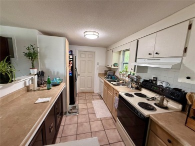 Discover Florida living in this inviting 2-bedroom, 1.5-bathroom on Venice East Golf Club in Florida - for sale on GolfHomes.com, golf home, golf lot
