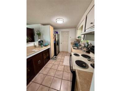 Discover Florida living in this inviting 2-bedroom, 1.5-bathroom on Venice East Golf Club in Florida - for sale on GolfHomes.com, golf home, golf lot