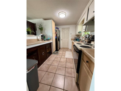 Discover Florida living in this inviting 2-bedroom, 1.5-bathroom on Venice East Golf Club in Florida - for sale on GolfHomes.com, golf home, golf lot