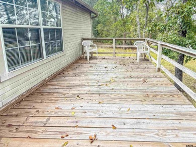 Nestled among the towering pines of East Texas, this beautifully on Holly Lake Ranch Golf Club in Texas - for sale on GolfHomes.com, golf home, golf lot