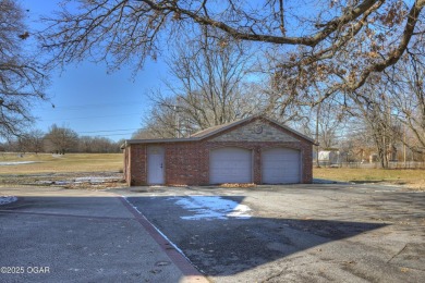 Luxury home located off the #3 tee box in Baxter Springs, KS on Baxter Country Club in Kansas - for sale on GolfHomes.com, golf home, golf lot