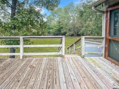 Nestled among the towering pines of East Texas, this beautifully on Holly Lake Ranch Golf Club in Texas - for sale on GolfHomes.com, golf home, golf lot